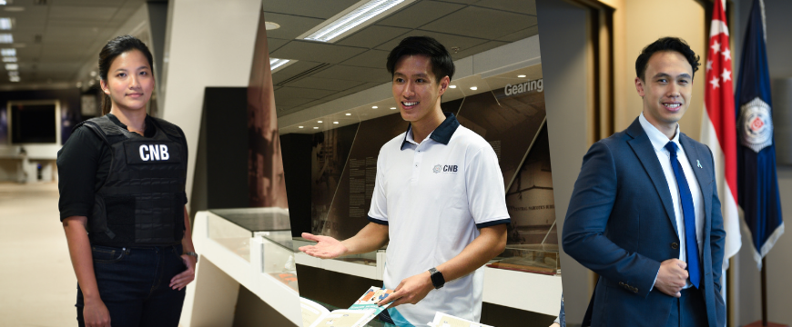 A hand holding Singapore Passport against an airplane window
